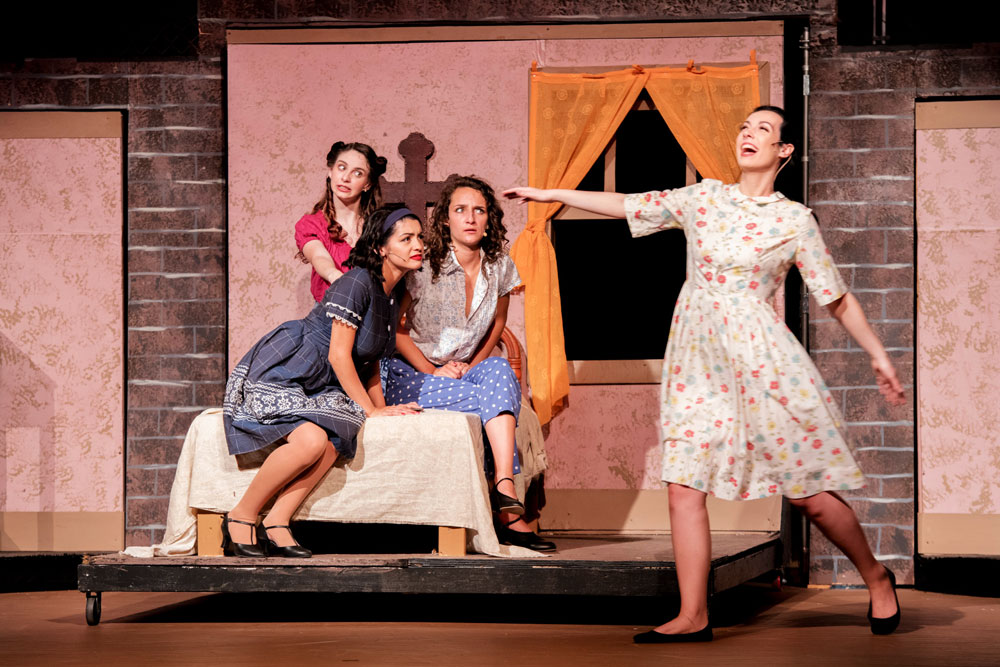 Community theatre actors singing in Leawood Stage Company's production of West Side Story